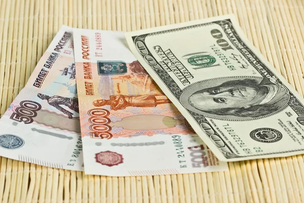 Russian rubles and US dollars on background napkins — Stock Photo, Image