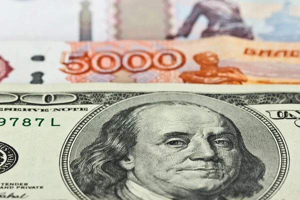 Currency: US dollars and Russian rubles — Stock Photo, Image