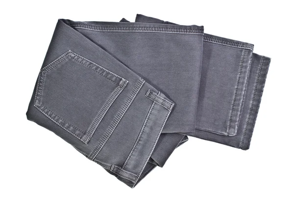Imagem jeans cinza em um fundo branco — Fotografia de Stock