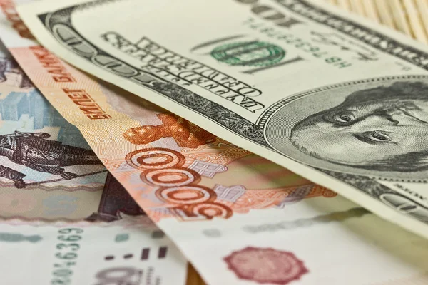 Russian and American money as background — Stock Photo, Image