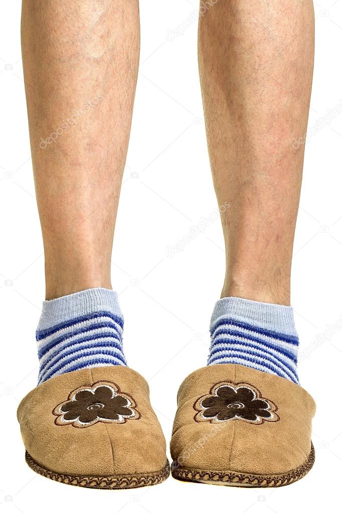 Men's feet on a white background