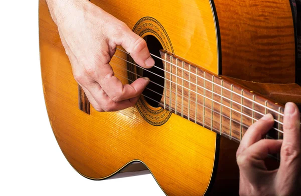 Male hands playing on acoustic guitar — Stock Photo, Image