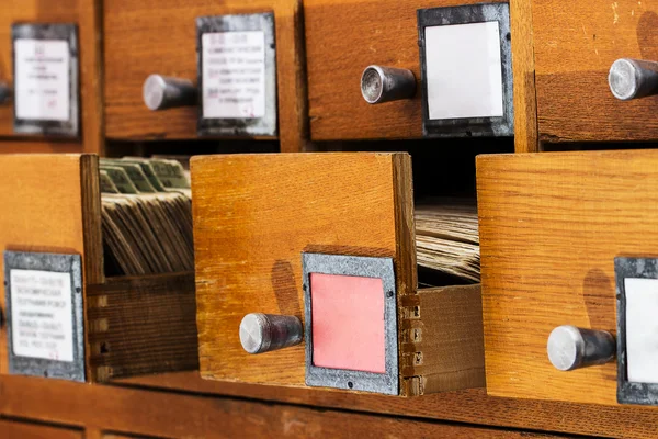 Open boxes in the old archive — Stock Photo, Image