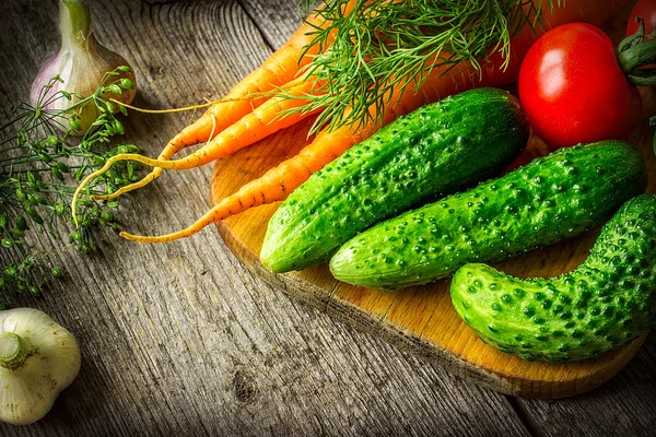 Fresh organic vegetable on wooden table — Stock Photo, Image