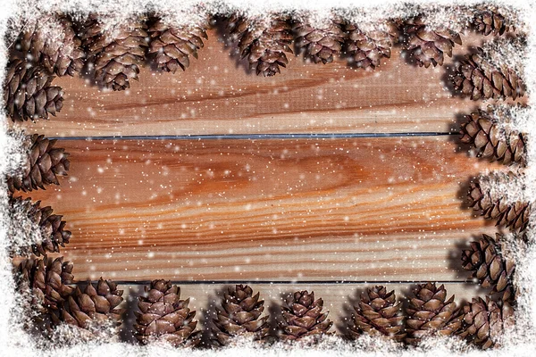 눈송이와 소나무 콘의 프레임 — 스톡 사진