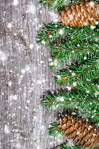 Christmas background on the old board with snowflakes — Stock Photo, Image
