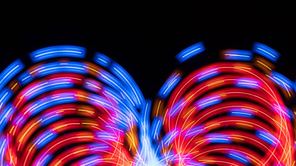 Abstract: Intriguing Swirls of Color Creating a Border on a Black Background