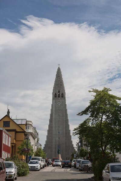 Reykjavik, Iceland - July 29, 2017: Hallgrimskirkja Cathedral in Reykjavik, Iceland, lutheran parish church, exterior in a sunny summer day with a blue cloudy sky.
