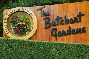 Wooden Welcome sign in Butchart gardens clipart