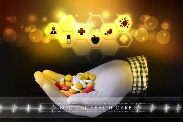 Doctor holding pills in hand — Stock Photo, Image