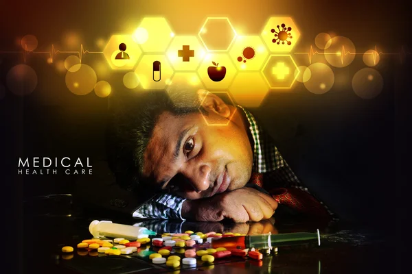 Doctor rest with heap of pills — Stock Photo, Image