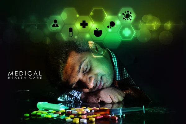 Doctor rest with heap of pills — Stock Photo, Image