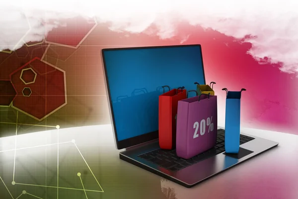 Shopping bags on laptop — Stock Photo, Image