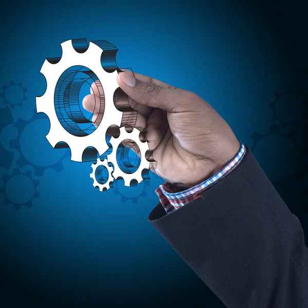 Businessman showing gears cogs — Stock Photo, Image