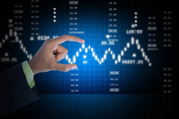 Affärsman innehar börskursdiagrammet — Stockfoto