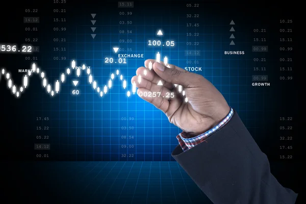 Affärsman innehar börskursdiagrammet — Stockfoto