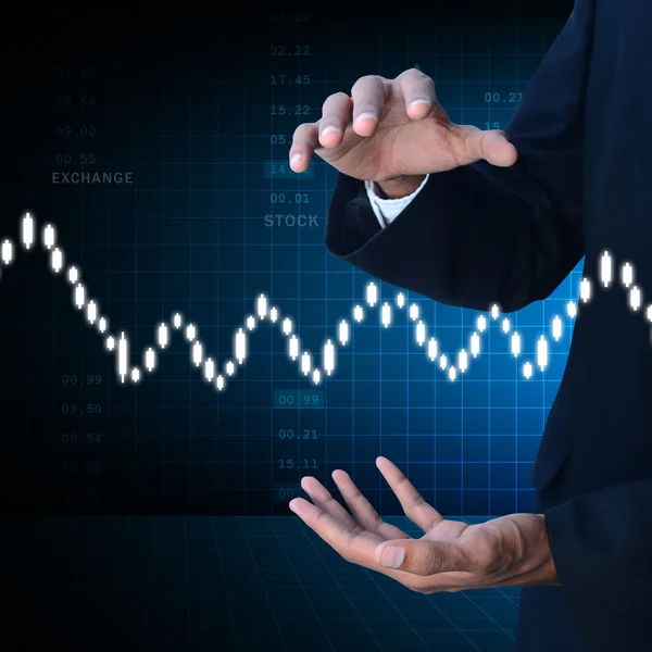 Businessman showing the stock chart — Stock Photo, Image