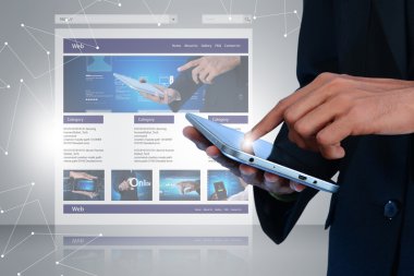 Businessman holding tablet pc