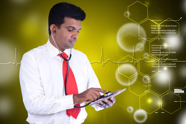 Man with stethoscope and tablet pc — Stock Photo, Image