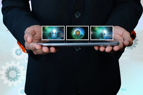 Businessman working with slides — Stock Photo, Image