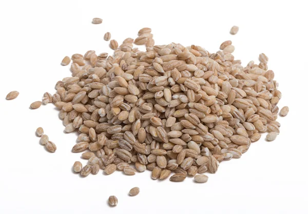 Small pile of pearl barley on white background — Stock Photo, Image