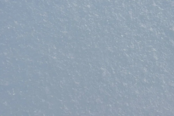 Het Oppervlak Van Een Pluizige Sneeuwdrift Met Sneeuwvlokken — Stockfoto