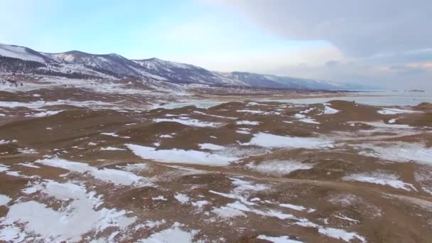 Аэросъемка с воздуха. Зима. Озеро Байкал. Маленькое море — стоковое видео