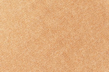 Bej örgü kumaş dokusunun soyut arkaplanı kapat