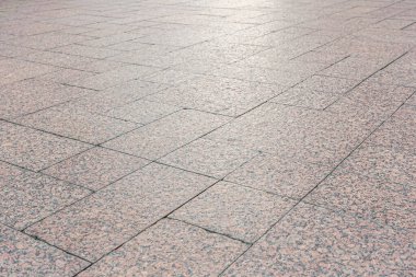 Granit kiremitlerle kaplı bir kaplamanın soyut arkaplanı 