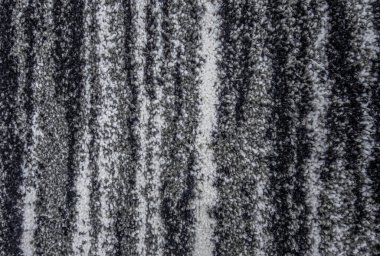 Siyah ve beyaz halı dokusunun soyut arkaplanı kapat