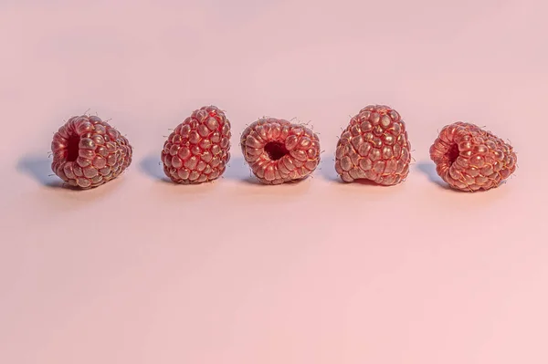 Sweet Ripe Raspberries Pink Surface Close — Stock Photo, Image