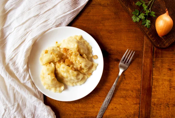 Homemade dumplings with vegetables and greaves — Stock Photo, Image