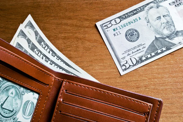 Money in an open leather wallet — Stock Photo, Image