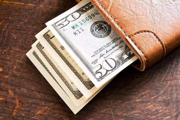 Leather wallet full of money — Stock Photo, Image