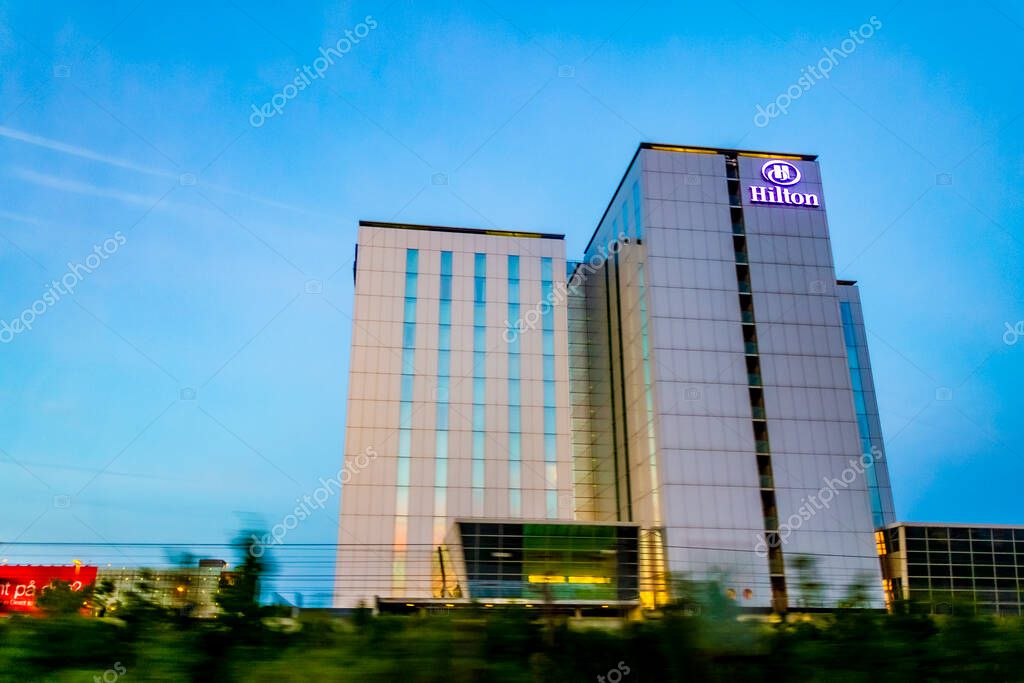 Driving by the Hilton Hotel in sunrise somewhere in Denmark.