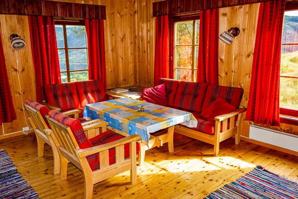 Cottage vacation interior decoration. Wooden living room in Vang i Valdres, Norway.