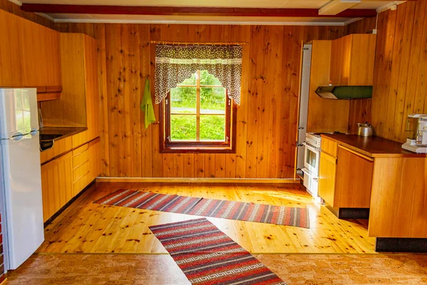 Cottage vacation interior decoration. Typical wooden kitchen in Vang i Valdres, Norway.