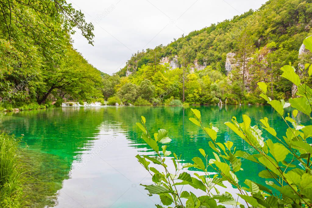 Plitvice Lakes National Park colorful landscape with turquoise blue and green water in Croatia.