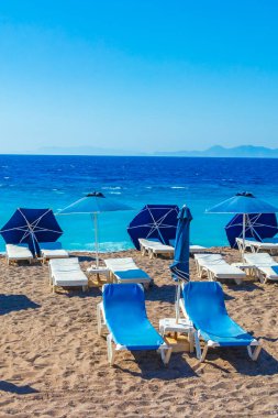 Rodos 'ta tatil yapan mavi güneş pansiyonlarında Elli sahilinin güzel turkuaz sularıyla rahatlayın..