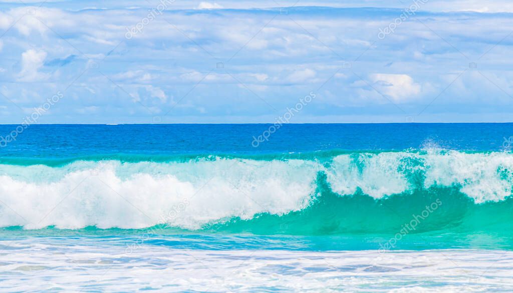 Strong waves at amazing Praia de Lopes Mendes beach on the big tropical island Ilha Grande in Angra dos Reis Rio de Janeiro Brazil.