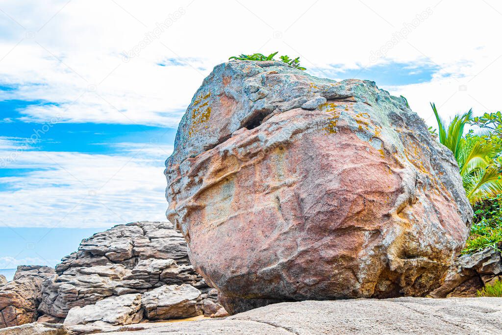 Huge rocks at amazing Praia de Lopes Mendes beach on the big tropical island Ilha Grande in Angra dos Reis Rio de Janeiro Brazil.