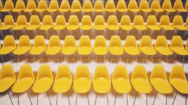 Hava aracı Coronavirus COVID-19 salgını sırasında boş stadyum sırasındaki turuncu koltuklar üzerinde uçuyor.