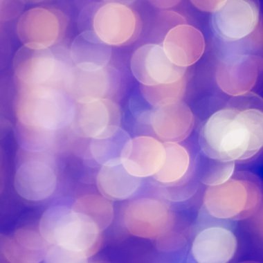 Altın ve mavi soyut bokeh ışıkları, parlaklığın odaklanmamış arka plan.