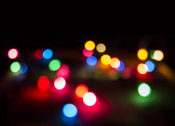 Luces Borrosas Navidad Sobre Fondo Oscuro Guirnalda Decorativa Luces Bokeh —  Fotos de Stock