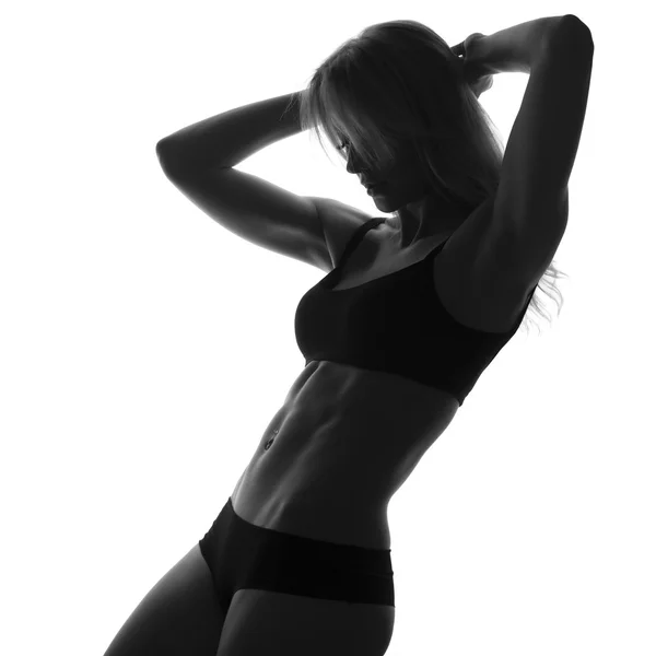 Sexy corpo donna slim fit. Addome muscoloso. Abbigliamento sportivo. Isolato — Foto Stock