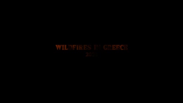 Вступ. Текстовий екран із текстом Wildfire In Greece 2021 для новин та реклами на ТВ. Світова екологічна криза. Концепція глобальної проблеми стихійних лих. — стокове відео