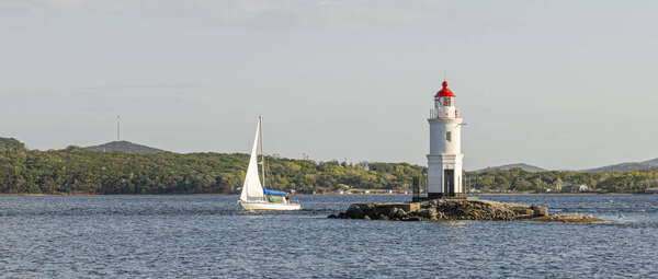   Russia. Vladivostok. Tokarevskaya Koshka Lighthouse in the Vostochny Bosphor Strait.