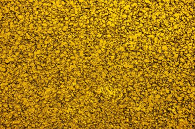 Yeni sarı asfalt. Doku, arka plan. Düz yatıyordu. Kapat.