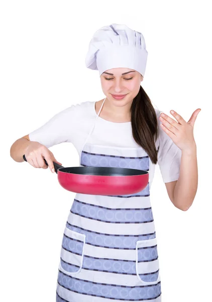 Девушка шеф-повар вдыхает аромат сковороды — стоковое фото
