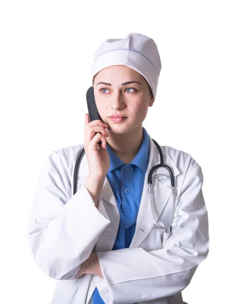 Médico mulher com auscultador atende a chamada — Fotografia de Stock